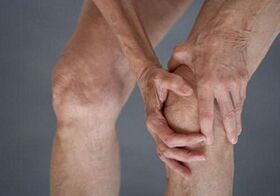 Self-massage of knees with Arthrosisis